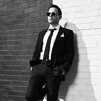 7e6.Jesse-Kirshbaum-200px-BW.png