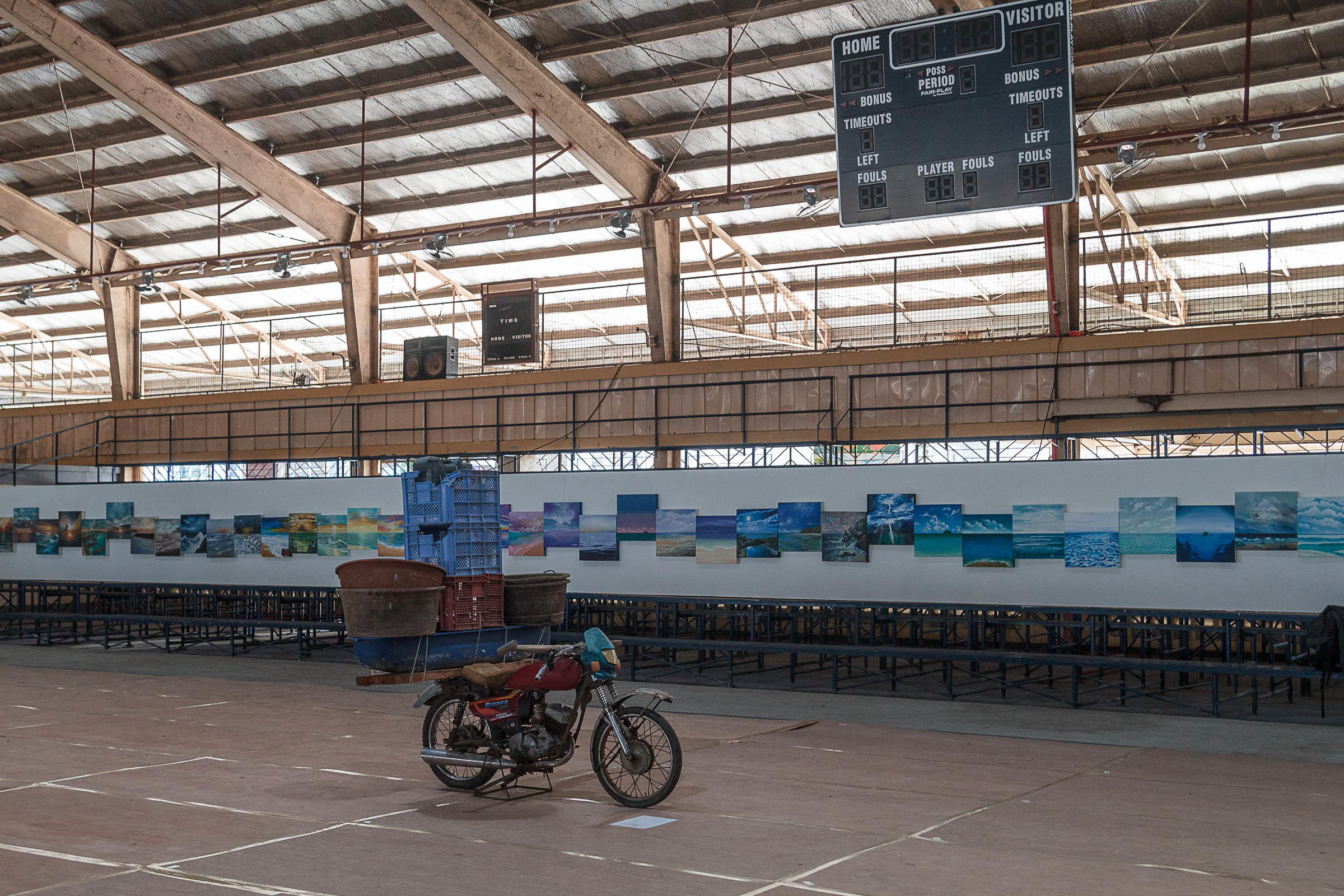 Bicycle in front of wall of pasted together images of the horizon